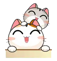 two cartoon cats are sitting next to each other on a table