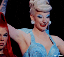 a woman in a blue dress is smiling and has t4yce tumblr written on the bottom
