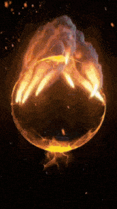 a large sphere of fire is surrounded by smoke