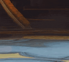 a close up of a person riding a roller coaster on a blue surface with smoke coming out of it .