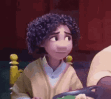 a cartoon character with curly hair is sitting in a chair looking at something .
