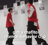 two men standing next to each other with a caption that says gab y mafito normal behavior o_o