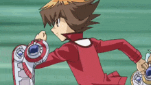 a boy in a red shirt is holding a red and white item