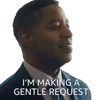 a man in a suit and tie is saying i 'm making a gentle request