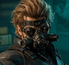 a man is wearing a gas mask and goggles on his face .
