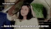 a woman is sitting at a piano and talking to a man .