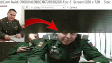 a man in a military uniform is sitting in front of a screen that says ebcam hwid