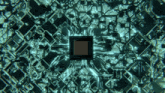 a computer circuit board with a square in the center