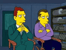 two cartoon characters sitting in front of a bookshelf with their arms crossed