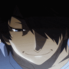 a close up of a person 's face with a smile on his face