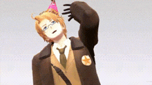 a man in a suit and tie is wearing a party hat .