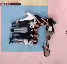 a group of people laying on their backs on a mat
