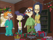 a group of rugrats characters are standing in a living room with presents
