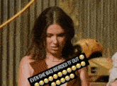 a woman with a sticker that says even she was weirded tf out