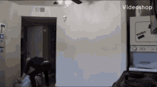 a video of a kitchen with the words videoshop on the bottom