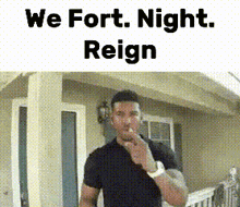 a man is smoking a cigarette in front of a house with the words `` we fort night reign '' written above him .