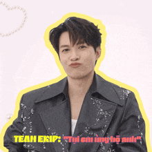 a man in a black jacket with the words team ekip written on the bottom