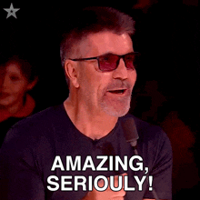a man wearing sunglasses says amazing seriously