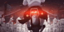 a man is riding a motorcycle in a city with a red light on the back .