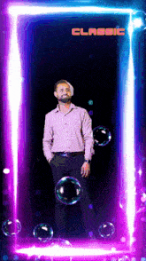 a man stands in front of a neon frame that says classic on it