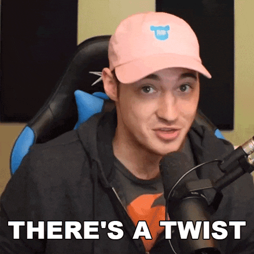 a man sitting in front of a microphone with the words 