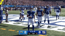 a cbs sports broadcast of a football game between the la chargers and the new york giants