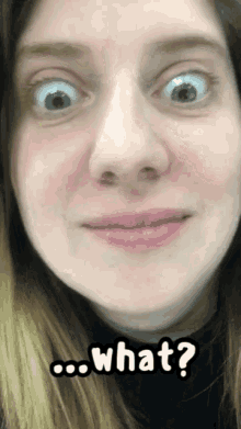 a close up of a woman 's face with the words what written below her