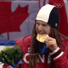Biting The Medal Speed Skating GIF - Biting The Medal Speed Skating Olivier Jean GIFs