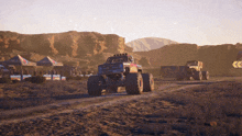 a monster truck is driving down a dirt road and has a sticker on the back that says ' rc '