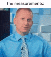 a man in a blue shirt and tie is talking into a microphone with the words " the measurements " below him