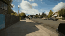 a cartoon drawing of a person walking down a street with a sign that says ' a few steps '