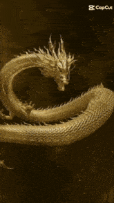 a picture of a golden dragon with a capcut logo on the bottom