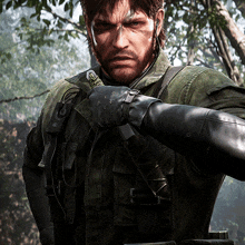 a man in a military uniform is holding a knife in his hand