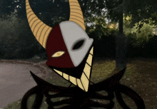 a drawing of a monster with horns and a red and white face