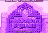 a purple sign for sarasota square mall commercial jingle