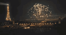 a fireworks display over a city at night