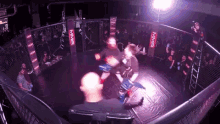 a boxing ring with mma written on the side of it