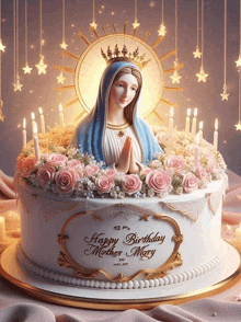 a birthday cake with a statue of the virgin mary on top