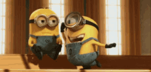 Although We Act Like We Don’t, At The End Of The Day We Love Our Annoying Friends To Peices! :D GIF - Despicable Me Punch High Five GIFs