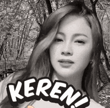 a black and white photo of a woman with the word keren written on her face