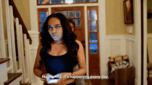 a woman says no i 'm not it 's happening every day in front of a door
