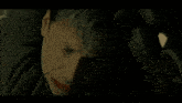 a close up of a man with the words " it is the sound of your death " below him