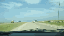 a view of a highway through a windshield