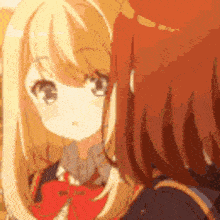 a couple of anime girls are standing next to each other looking at each other .