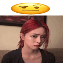 a woman with red hair and a yellow smiley face above her head