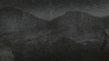 a drawing of a car flying over a rocky hillside