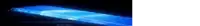 a blue object is glowing in the dark with a white background .