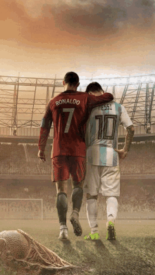 two soccer players ronaldo and messi walking on the field