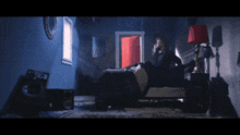 a person laying on a bed in a room with an open door