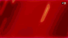 a red background with a white number 5 in the middle